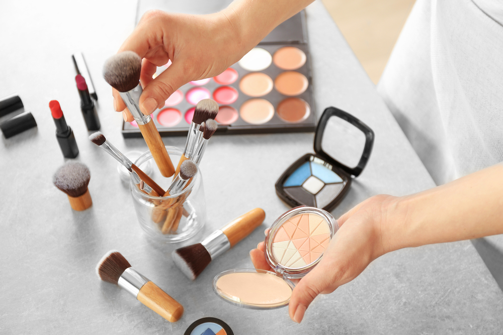 Make up test. Work with cosmetics. cosmetics with your own hands. make up table close up.
